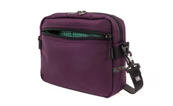 The Side Kick in Aubergine (dark purple) Ballistic with a Sitka (dark green with white grid) 200 Halcyon interior.